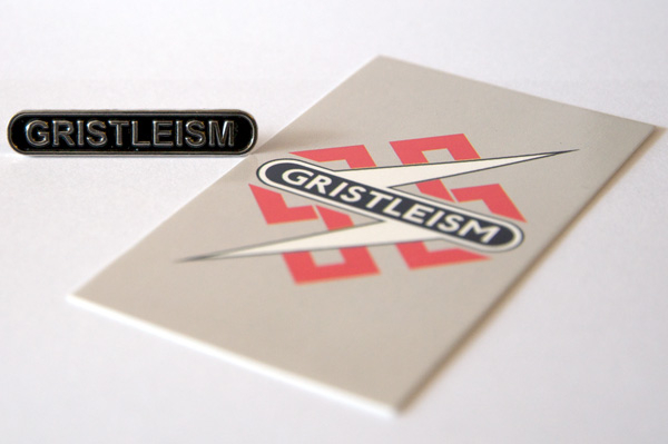 View full size Throbbing Gristle - TG Gristleism Metal Pin Badge & Card of Gristleisms